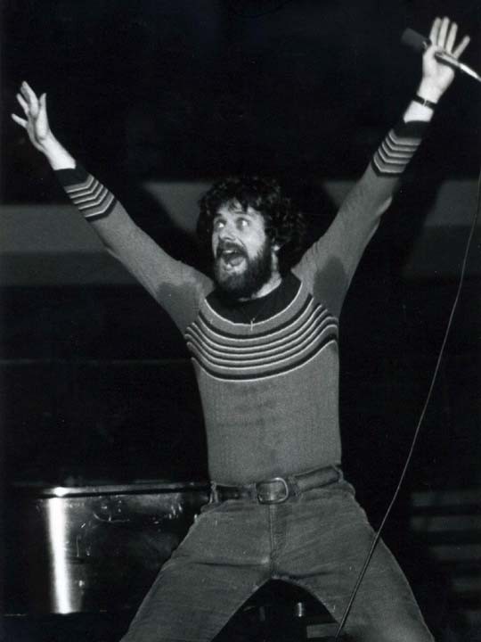 Keith in concert, dramatizing his message of mass-produced, "cookie-cutter Christians."  Anaheim, CA  1981.